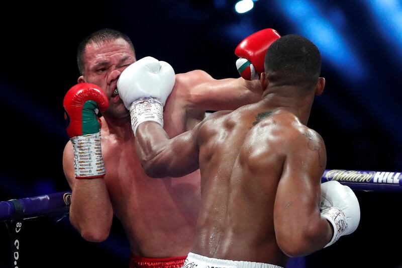 Pulev feels the power of Joshua's punch.
