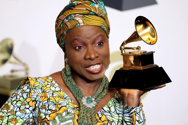 epa08168553 Angelique Kidjo poses in the press room with the Grammy for Best World Music Album during the 62nd annual Grammy Awards ceremony at the Staples Center in Los Angeles, California, USA, 26 January 2020.  EPA-EFE/DAVID SWANSON