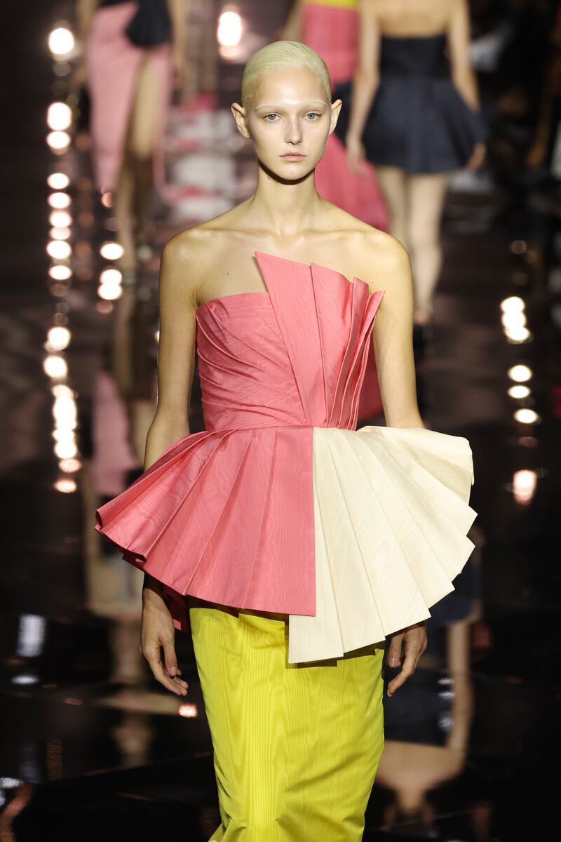 Cocktail dress by Roberto Cavalli, in coral and chartreuse watered silk. Getty 