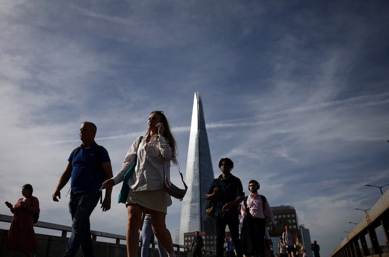 Commuters on London Bridge. The UK unemployment rate rose to 3.7 per cent in the three months to November. Reuters