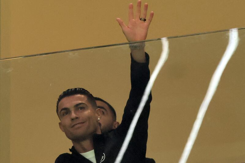 Cristiano Ronaldo waves to spectators. The Al Nassr captain was ruled out of the match against Inter Miami through injury. AFP