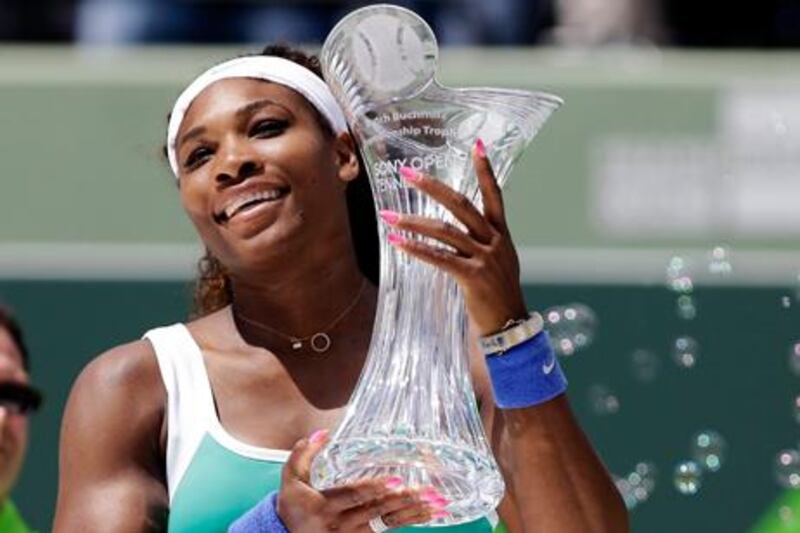 Serena Williams displays the Sony Open trophy after her win over Maria Sharapova.
