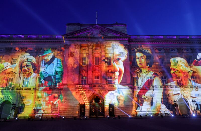 Projections are seen displayed on the front of the Buckingham Palace during the lighting of the principal jubilee beacon, as part of Queen Elizabeth II's platinum jubilee celebrations, in London, Britain June 2, 2022.  Reuters