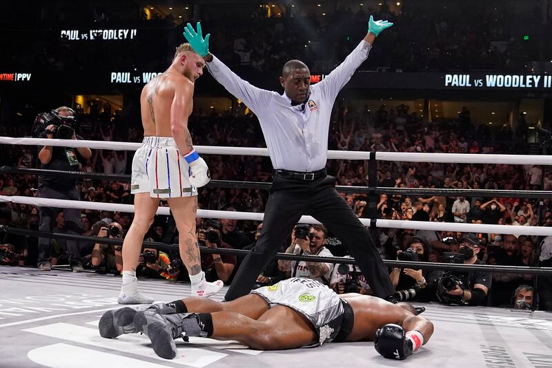 Jake Paul looks back after knocking out Tyron Woodley during the sixth round of their cruiserweight fight in Tampa. AP