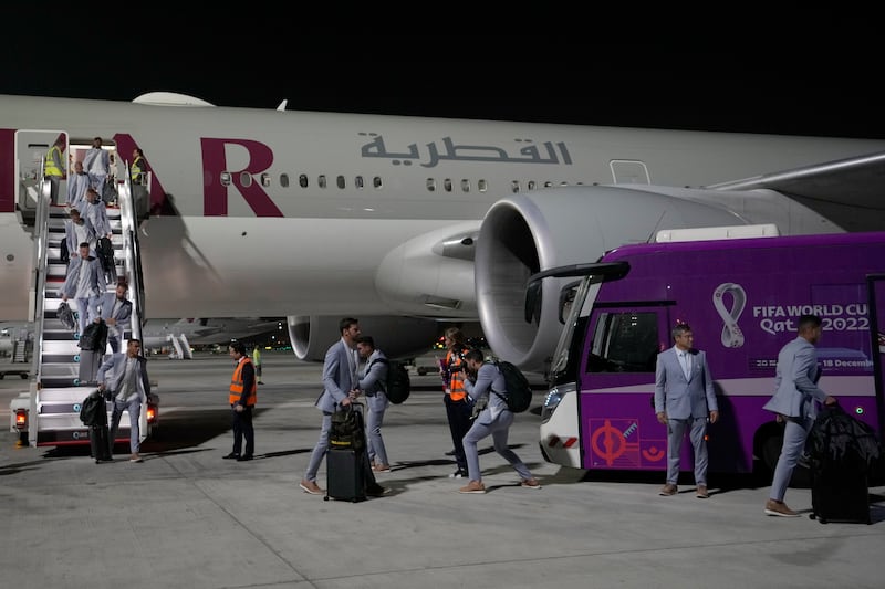 Brazil players and staff arrive at Hamad International Airport. AP