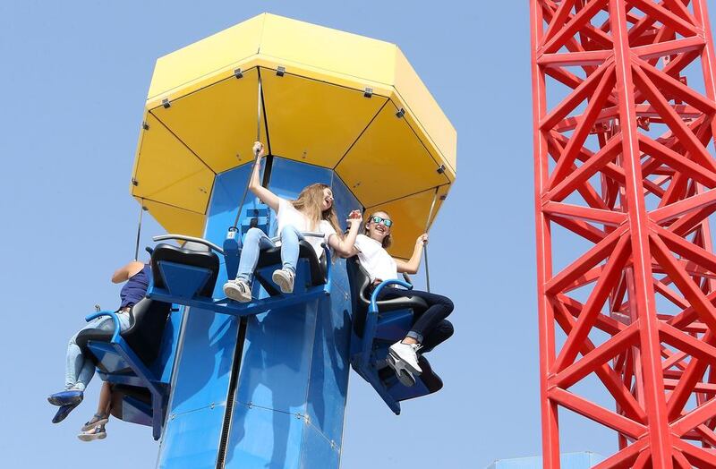 Visitors enjoy the Kids Power Tower ride.  Pawan Singh / The National