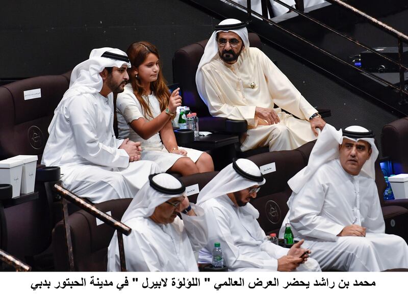 Sheikh Mohammed bin Rashid watches La Perle with Sheikh Maktoum bin Mohammed and Sheikha Jalila bint Mohammed on Saturday. Wam