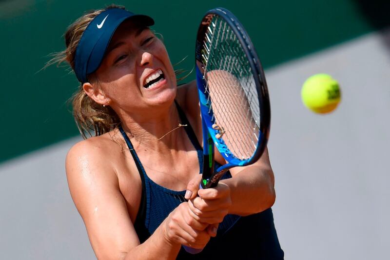 Russia's Maria Sharapova plays a backhand return to Croatia's Donna Vekic during their women's singles second round match on day five of The Roland Garros 2018 French Open tennis tournament in Paris on May 31, 2018. / AFP / CHRISTOPHE SIMON
