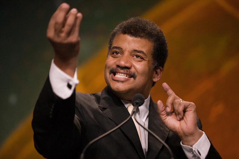 Neil deGrasse Tyson, director of the Hayden Planetarium, speaks during the 28th National Space Symposium in Colorado. Mr deGrasse Tyson addressed the World Government Summit in Dubai on Monday. Matthew Staver / Bloomberg