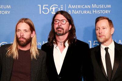 Taylor Hawkins, Dave Grohl and Nate Mendel of Foo Fighters at The Museum Gala at the American Museum of Natural History in New York City in November 2021. AFP