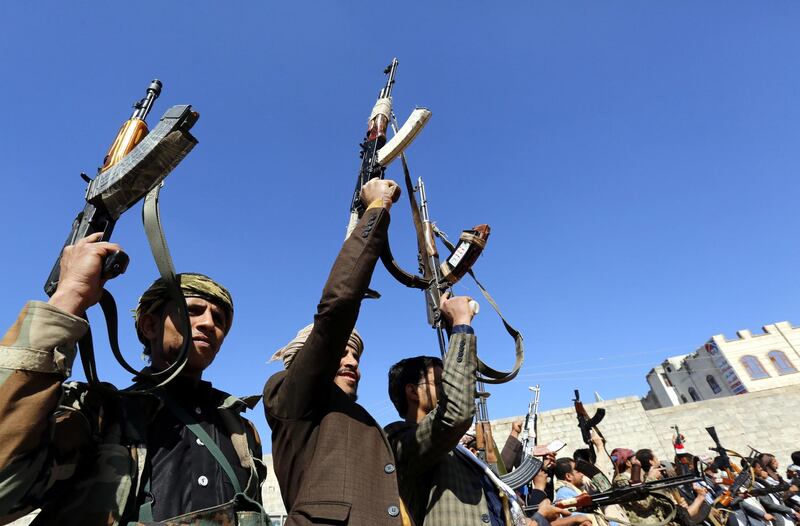 epa07229219 Supporters of the Houthi rebel movement hold up weapons during a gathering to show support to the Houthi rebels, in Sana'a, Yemen, 13 December 2018. According to reports, Yemen's warring parties have agreed on reopening the Sana'a airport, the resumption of oil exports and a ceasefire in the Red Sea port city of Hodeidah, as a new round of UN-brokered peace consultations between representatives from Yemen's internationally-recognized government and the Houthi rebels came to a close in Sweden, nearly four years after escalating fighting in the Arab country.  EPA/YAHYA ARHAB