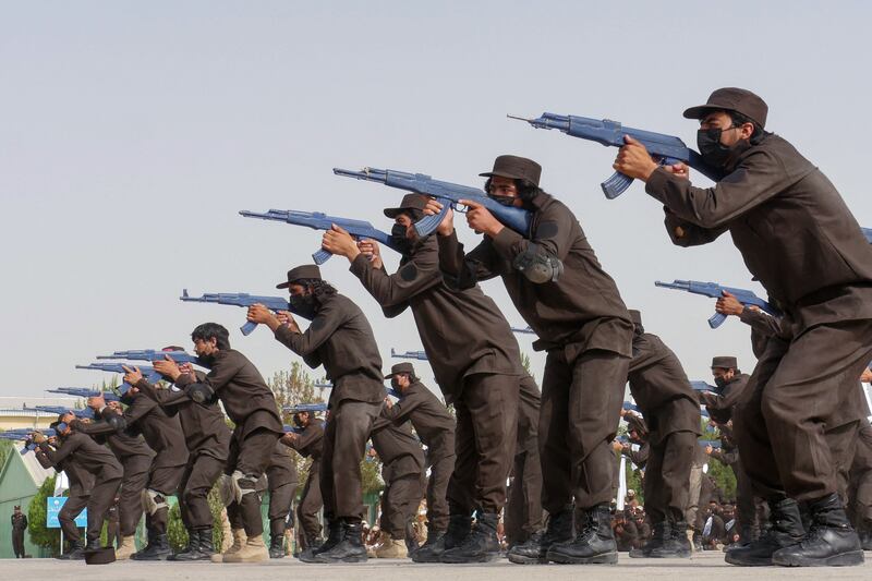 New recruits to the Taliban's security forces demonstrate their skills during a graduation ceremony in Afghanistan's Herat province on June 22. AFP