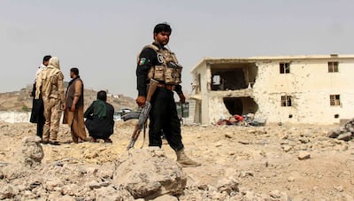 Afghan security forces at the site of a Taliban bomb attack in Kandahar, one of the cities under threat from the terrorist group. EPA