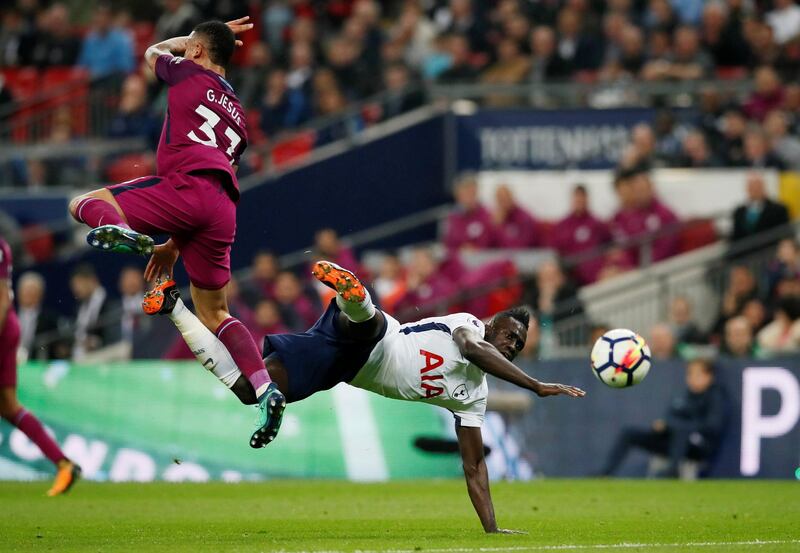 Manchester City's Gabriel Jesus in action with Tottenham's Davinson Sanchez. David Klein / Reuters