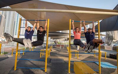 DUBAI UNITED ARAB EMIRATES  15 September 2018 -The "Mafi Wafi"  group (L-R) Yamen, Ahmad, Lola and Mohammed a health and fitness group of young people who want to encourage the youth to be fit and workout rather than spending all their time on the phone, doing training at the Sky Dive Dubai Calisthenics Park.  Leslie Pableo for The National for Haneen Dajani story