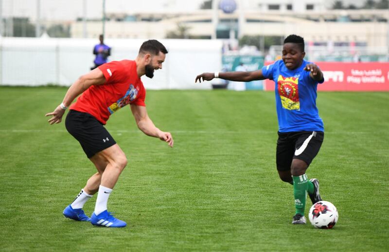 Abu Dhabi, United Arab Emirates - Finn Balor, an Irish professional wrestler signed to WWE plays for the second match of the Unified Sports Experience at Zayed Sports City. Khushnum Bhandari for The National