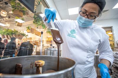 Luchie Suguitan shows how sweet treats are made at Co Chocolat. Leslie Pableo for The National