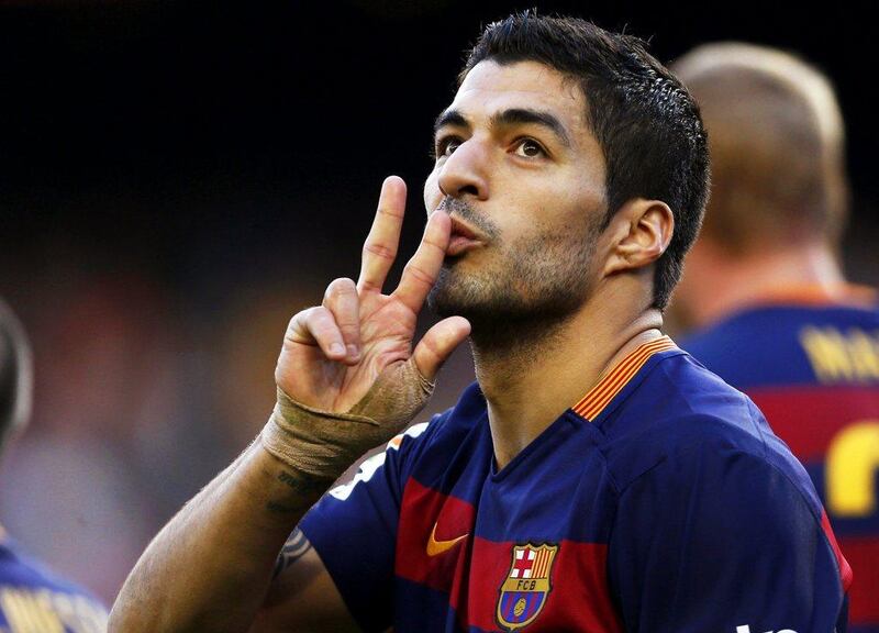 Barcelona’s Luis Suarez celebrates after scoring Barca’s second goal against Real Sociedad.   EPA/ALEJANDRO GARCIA