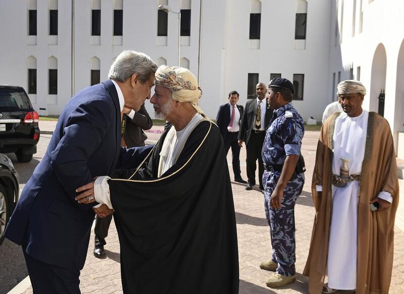 US secretary of state John Kerry, left, is greeted by the Oman’s foreign minister, Yusuf bin Alawi bin Abdullah, in Muscat, Oman on November 14, 2016. Mark Ralston via AFP