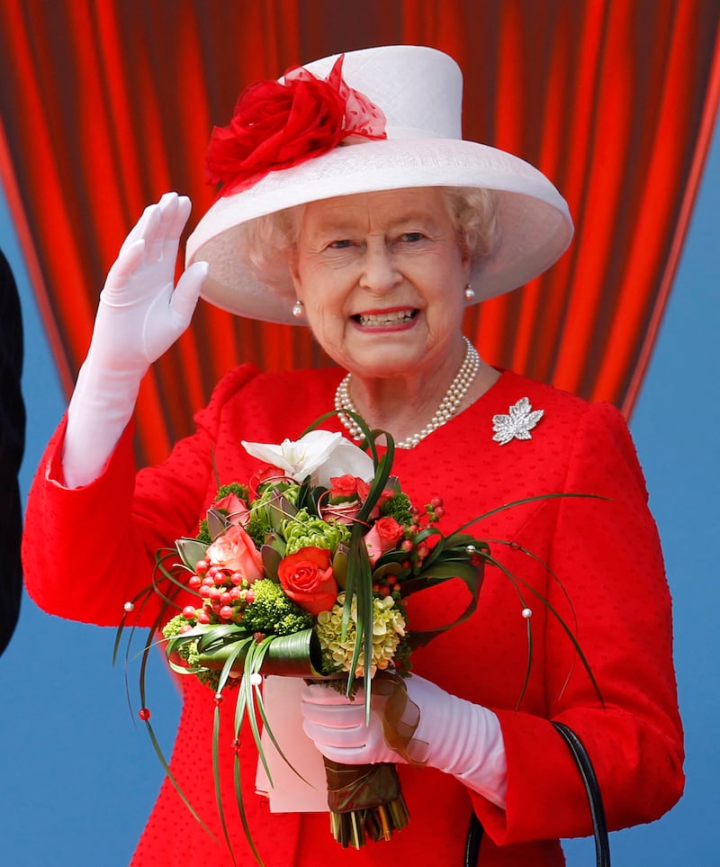 Queen Elizabeth II wears the Canadian maple leaf diamond brooch, given to the Queen Mother in 1939, in Ontario, Canada, in July 2010. AFP