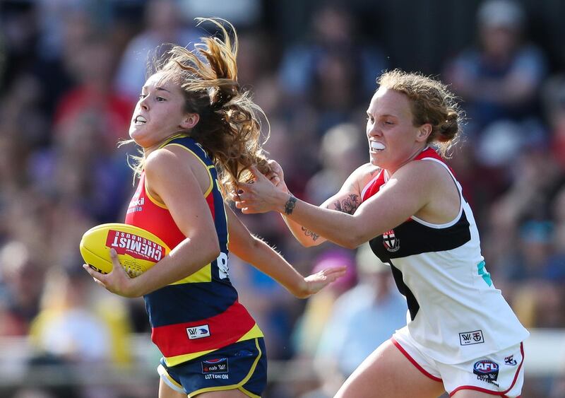 St Kilda Saints' Tilly Lucas-Rodd attempts to stop Madison Newman of the Adelaide Crows during the AFLW match at the Richmond Oval in Adelaide on February 16. Getty