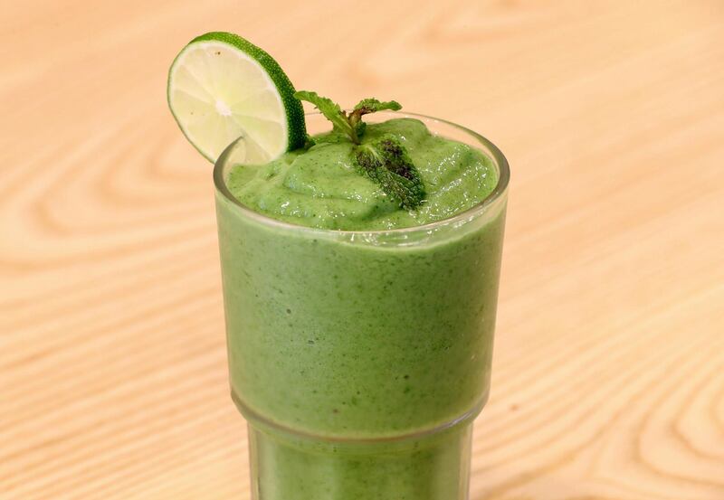 Abu Dhabi, United Arab Emirates - September 15, 2019: Green detox smoothie. A look at the newly opened Sweet Greens café. They have a special focus on being healthy and environmentally friendly. Sunday the 15th of September 2019. Rihan Heights, Abu Dhabi. Chris Whiteoak / The National