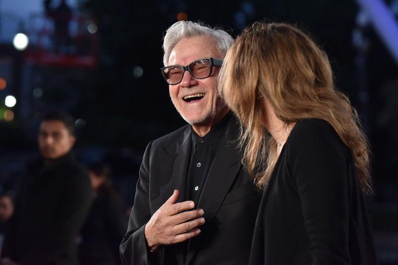 epa08040392 US actor/cast member Harvey Keitel (L) and his wife Daphna Kastner attend the screening of 'The Irishman' during the 18th annual Marrakech International Film Festival, in Marrakech, Morocco, 02 December 2019. The film festival runs from 29 November to 07 December 2019.  EPA/JALAL MORCHIDI