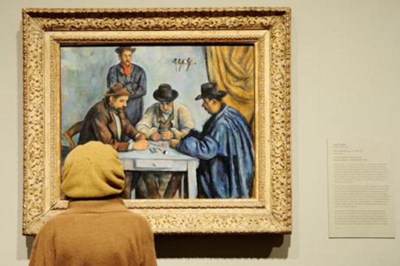The ruling royal family of Qatar has bought Paul Cézanne’s painting The Card Players, paying the highest price ever for a work of art. Stan Honda / AFP