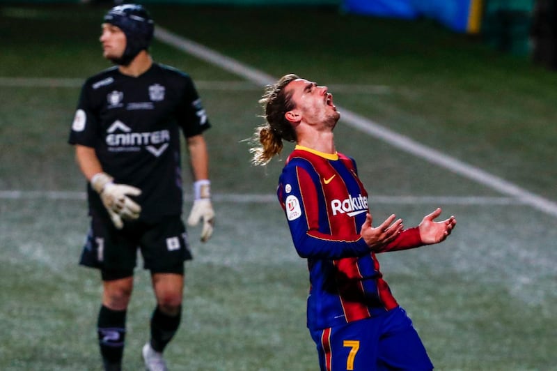 Barcelona's Antoine Griezmann reacts after missing a chance. AP