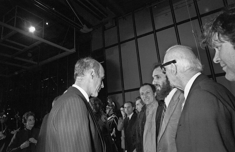 French President Valery Giscard d'Estaing congratulating Renzo Piano and Richard Rogers during the official inauguration of the Pompidou Centre in Paris in 1977. AFP