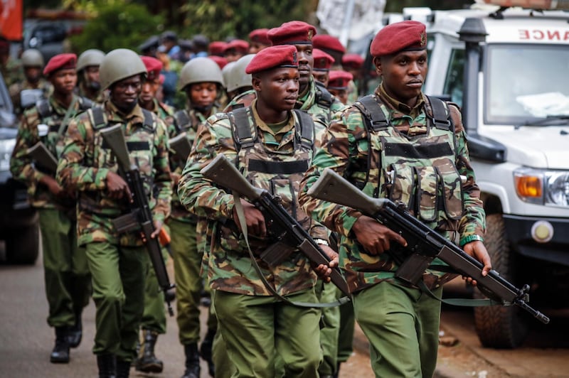 Kenyan police officers return from the scene inside a business complex in Nairobi, Kenya, a day after the attackers stormed the compound killing several people in an attack claimed by Somalia's Islamist militant group al-Shabab. Interior minister Fred Matiangi said late 15 January that security foces have secured all the buildings without giving details.  EPA