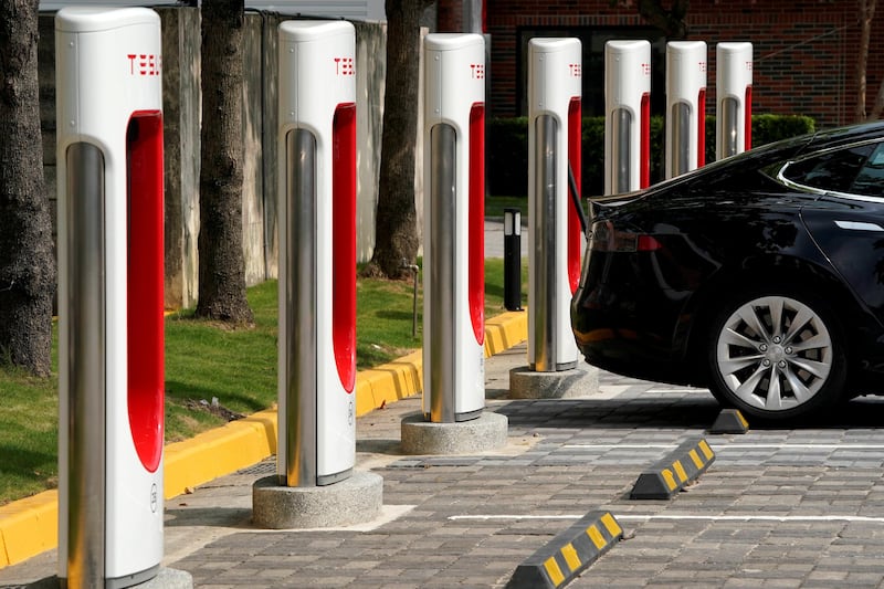 FILE PHOTO: Tesla Supercharger station are seen in Taipei, Taiwan August 11, 2017. REUTERS/Tyrone Siu/File Photo