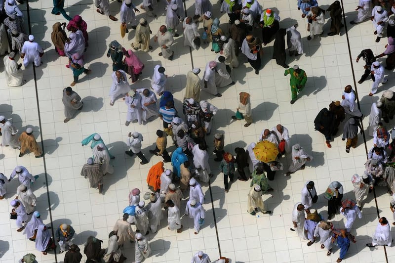 Pilgrims leave Mecca’s Grand Mosque after prayers on Friday as hundreds of thousands pour into the holy city in anticipation of Haj, which starts on Sunday. Fayez Nuredine / AFP