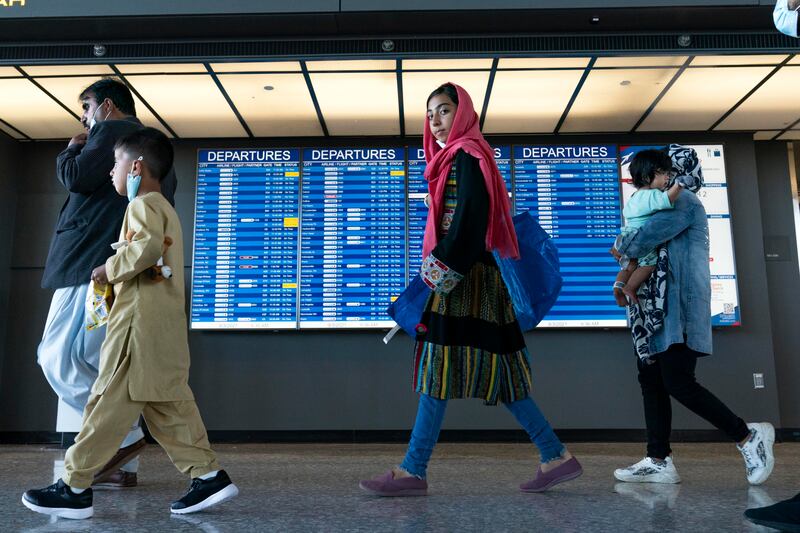 Families who made it out of Kabul arrive at Washington Dulles International Airport in the US. AP