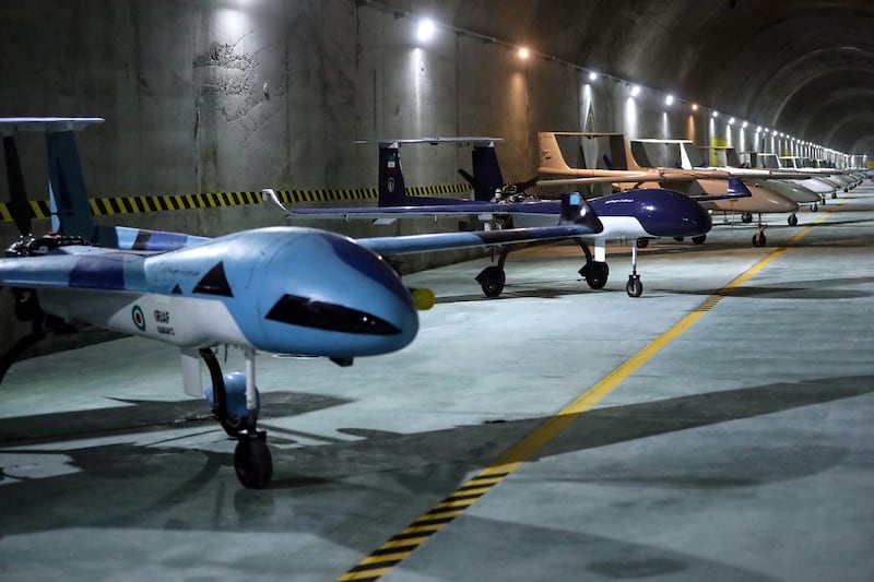 The Iranian Army released photos of a wide variety of drones lined up in long tunnels. AFP