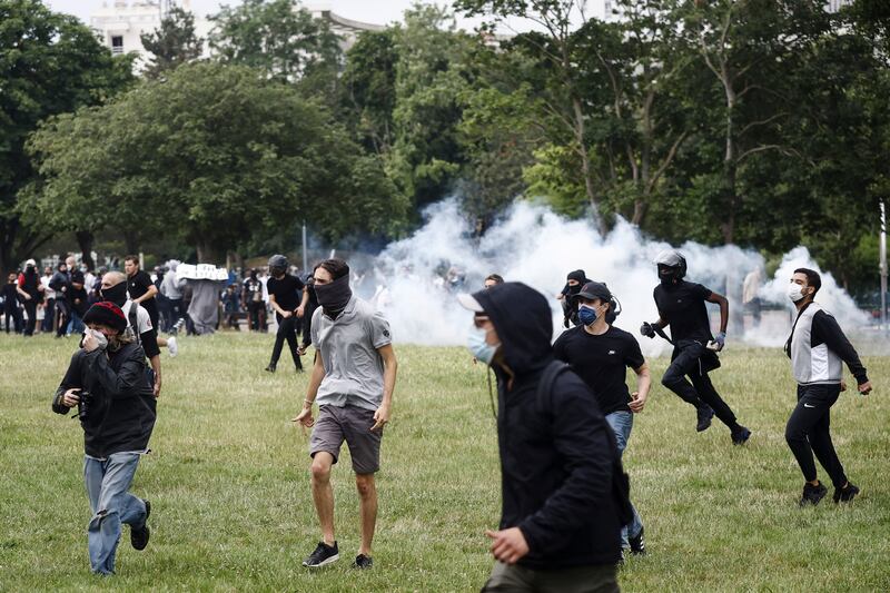 Protesters clash with French riot police after a march in memory of Nahel. EPA