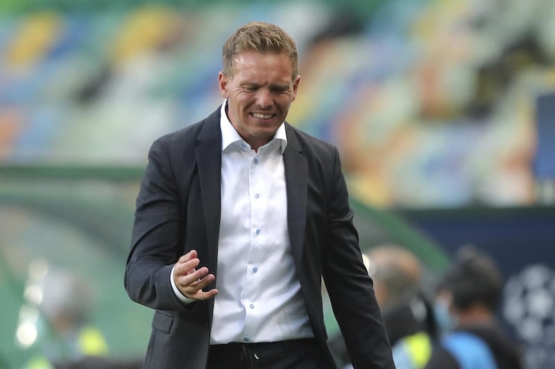 Leipzig's head coach Julian Nagelsmann grimaces during the Champions League quarterfinal match between RB Leipzig and Atletico Madrid at the Jose Alvalade stadium in Lisbon, Portugal, Thursday, Aug. 13, 2020. (Miguel A. Lopes/Pool Photo via AP)