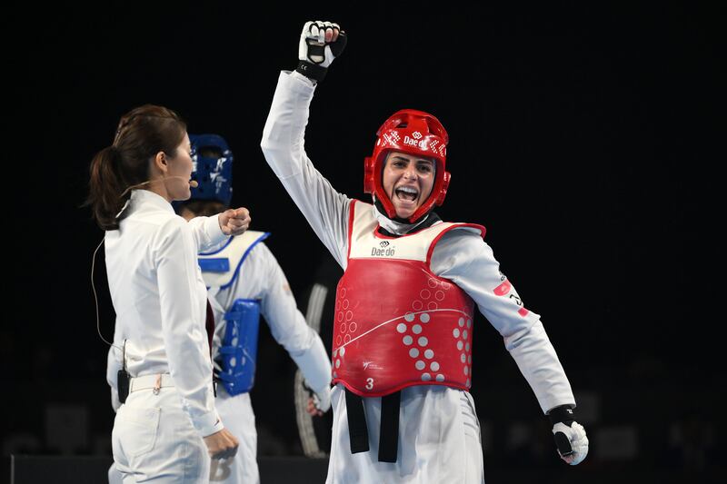 Julyana Al Sadeq of Jordan celebrates her win in the World Taekwondo Grand Prix final against Aleksandra Perisic of Serbia in the female -67kg category at Manchester Regional Arena in December 2023. Getty Images