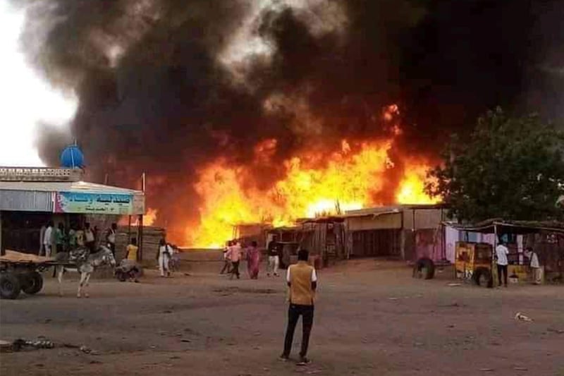 A fire rages at a livestock market after RSF bombardment in Al Fasher, the capital of North Darfur state, on September 1. AFP