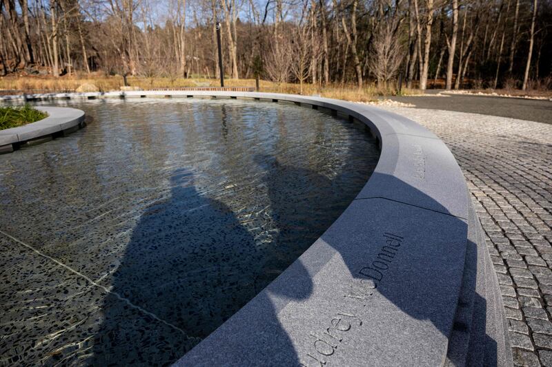 Water spirals anticlockwise towards the memorial's central planter. AFP