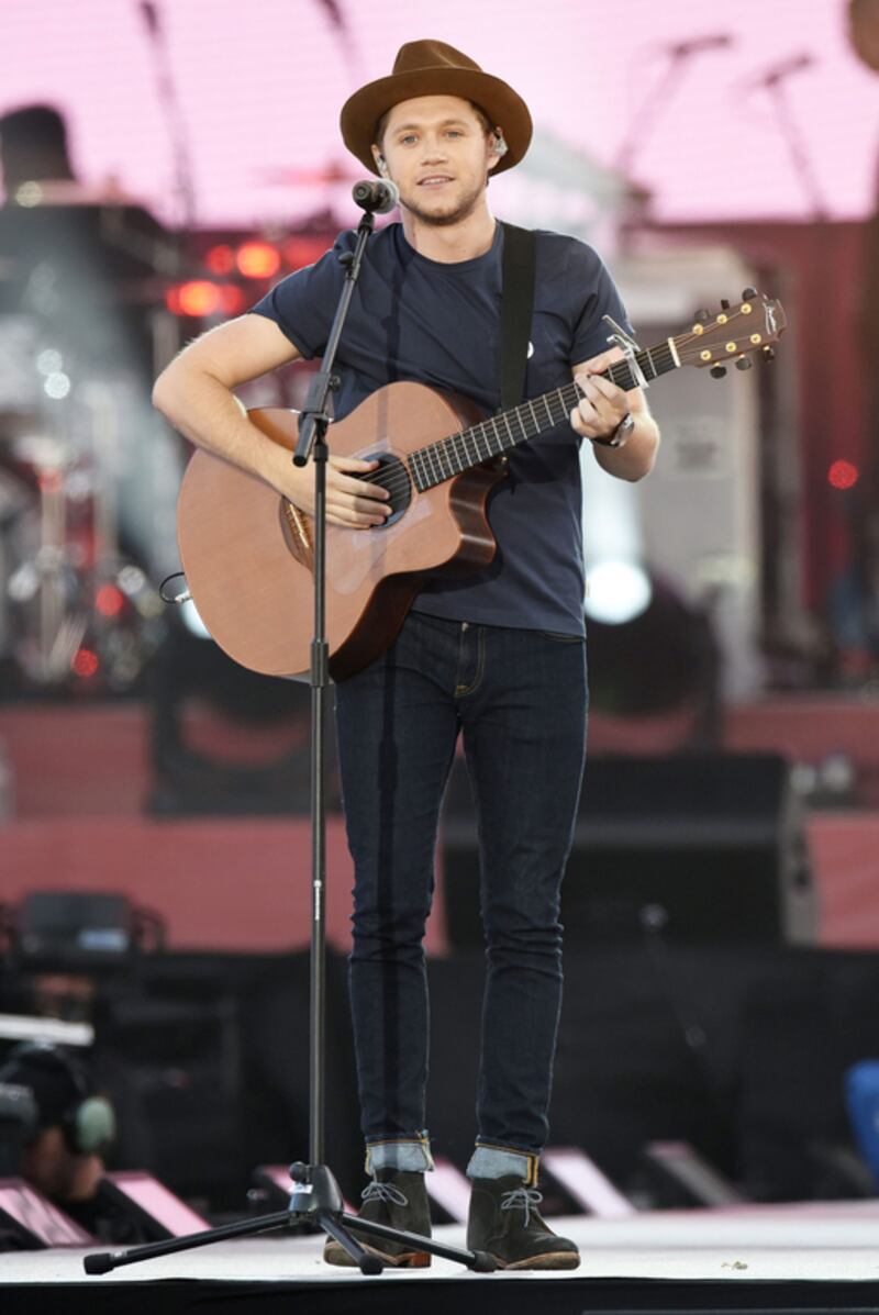 Singer Niall Horan performs. Proceeds from the concert will be donated to a fund set up to help the victims’ families. Dave Hogan via AP