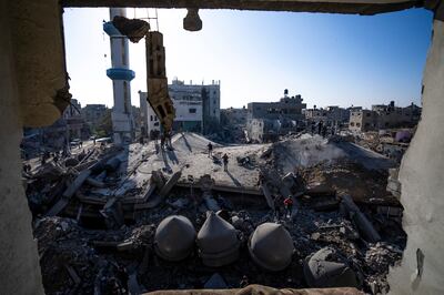 The minarets of Al Farooq Mosque in Gaza fell after an Israeli strike that killed about 100 people. AP
