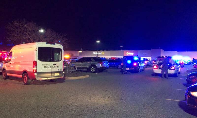 Police respond to a fatal shooting at a Walmart shop in Chesapeake, Virginia, on November 22.  All photos: AP