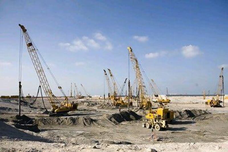 Construction takes place on the site of the future Louvre museum on Saadiyat Island. Lauren Lancaster / The National