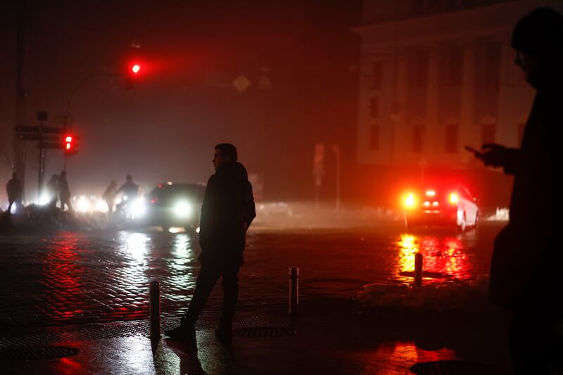 An unlit street following missile strikes in Kyiv. Getty Images