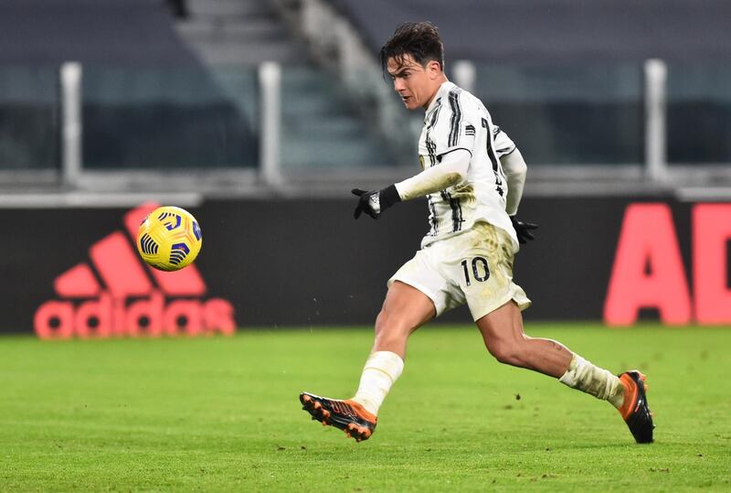 Juventus' Paulo Dybala scores their fourth. Reuters