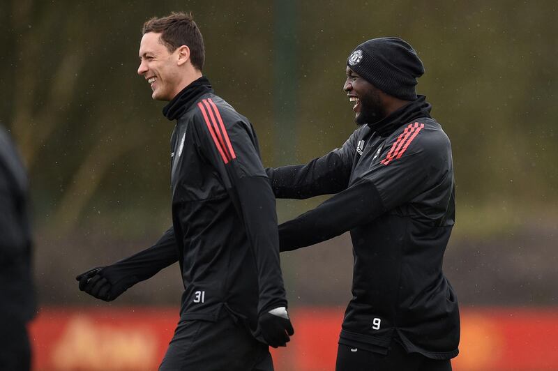 Manchester United's Serbian midfielder Nemanja Matic (L) and Manchester United's Belgian striker Romelu Lukaku attend a team training session at the club's training complex near Carrington, west of Manchester in north west England on March 12, 2018, on the eve of their UEFA Champions League round of 16 second-leg football match against Sevilla. / AFP PHOTO / Oli SCARFF