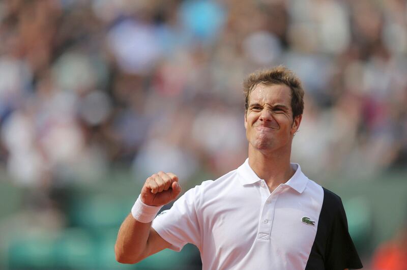 Richard Gasquet of France reacts during his men's singles match against Stanislas Wawrinka of Switzerland at the French Open tennis tournament at the Roland Garros stadium in Paris June 3, 2013. REUTERS/Stephane Mahe (FRANCE  - Tags: SPORT TENNIS)   *** Local Caption ***  RGT220_TENNIS-OPEN_0603_11.JPG