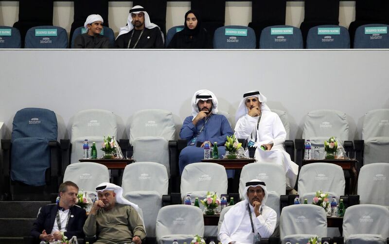 Spectators watch the action unfold. Reuters