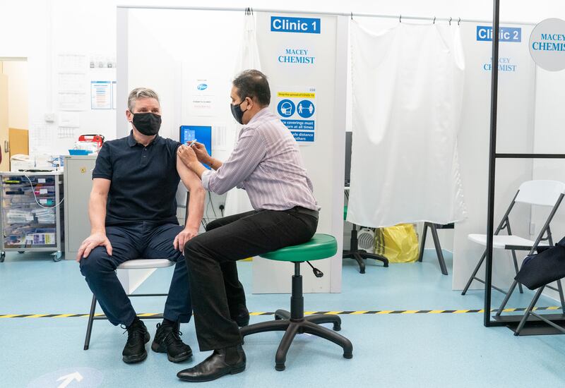 Labour Party leader Sir Keir Starmer receives his booster vaccination at a pharmacy in London. PA